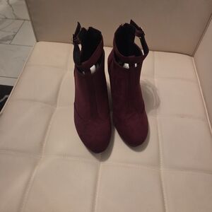 Chic Burgundy Ankle Booties with gold Accents.. Suede Feel on the booties...